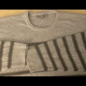 Cozy grey sweater with black and brown stripes